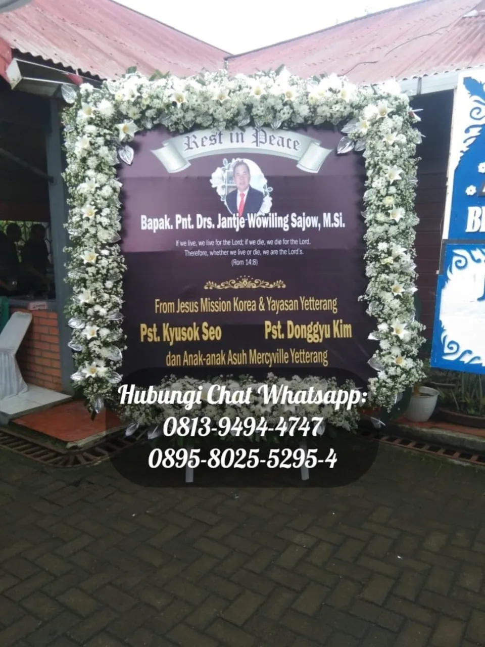 Papan Duka Cita Ungu Bingkai Lili Putih